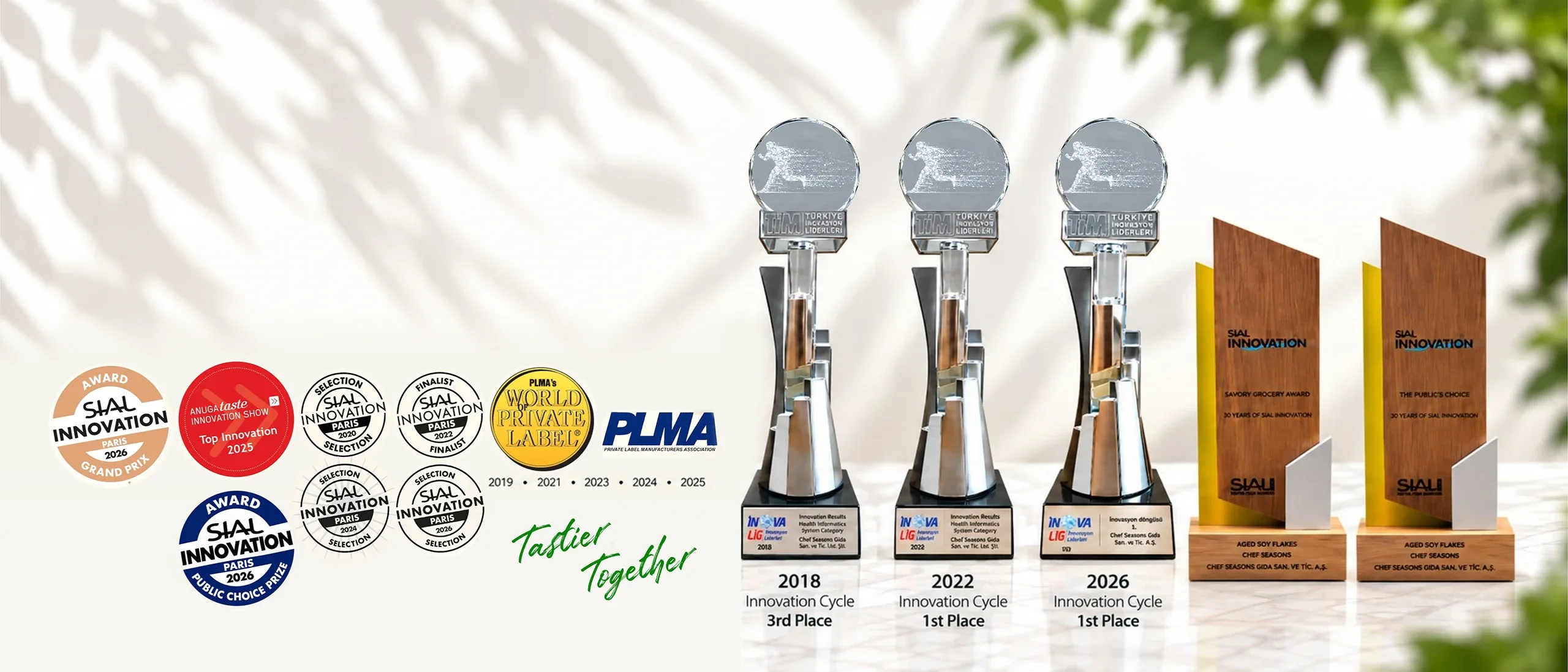 SIAL Innovation, Anuga Taste Innovation Show and World Private Label Awards badges, with two TİM Innova trophies